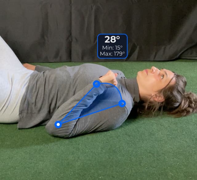 Side view of patient, supine, demonstrating the flexion / extension movement. Visual overlay shows a 28 degree angle measurement.