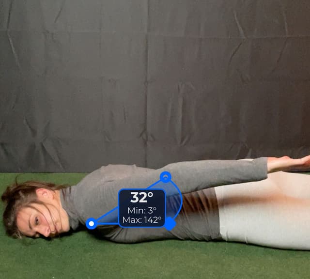 Side view of patient, prone, demonstrating the flexion/extension movement. Visual overlay shows a 32 degree angle measurement.